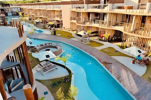 an image of the pool at a resort at Condo with Beach Access By MME in Tatuamunha
