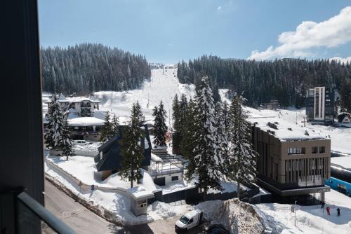 a view of a snow covered ski slope at SkyHill Jahorina Poljice Gondola in Jahorina