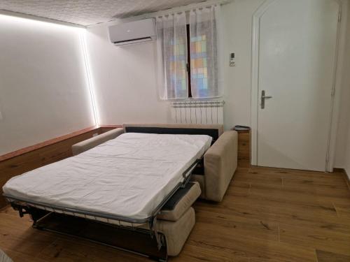 a hospital room with a bed and a window at VENEZIA Playa in Chioggia