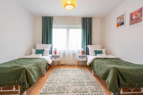 a bedroom with two beds and a window at Wohnung in Essen in Essen