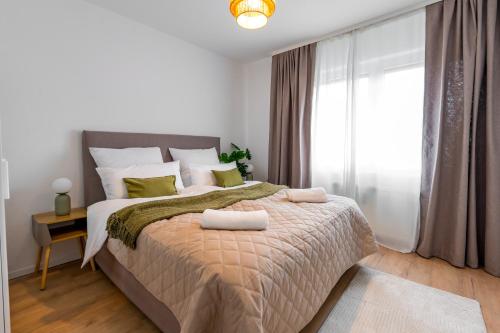 a bedroom with a large bed and a window at Wohnung in Essen in Essen