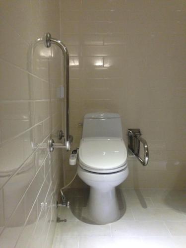 a bathroom with a toilet in a stall at Hotel 8 Hours in Seoul