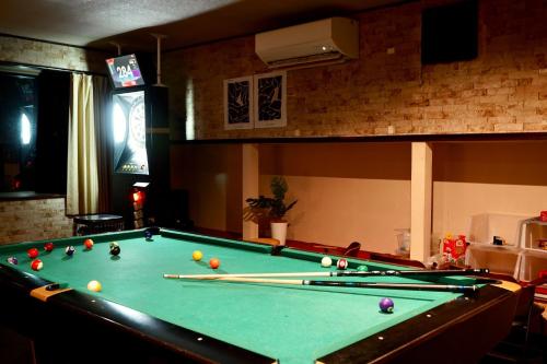 a pool table with balls on it in a room at Sea Hale - Vacation STAY 7734 in Yuzawa