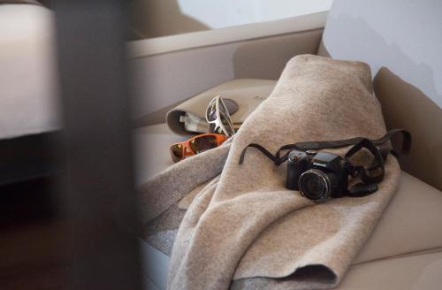 a camera sitting on a towel in a box at Casa Alla Lega in Arco
