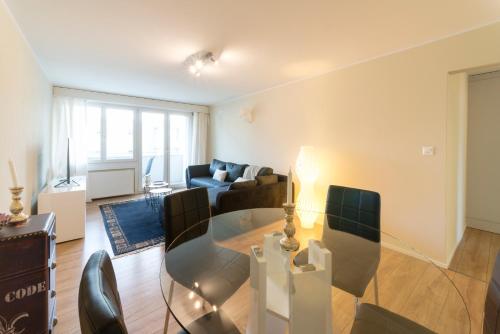 Гостиная зона в RELOC Serviced Apartments Wallisellen Bhf.