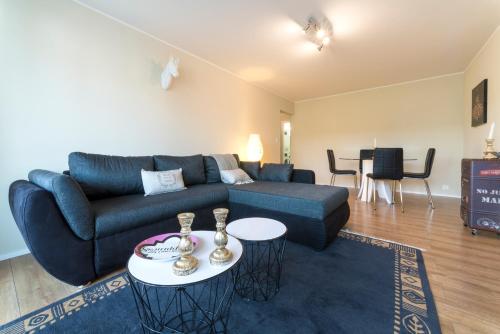 Гостиная зона в RELOC Serviced Apartments Wallisellen Bhf.