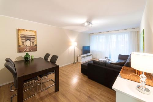 Гостиная зона в RELOC Serviced Apartments Wallisellen Bhf.