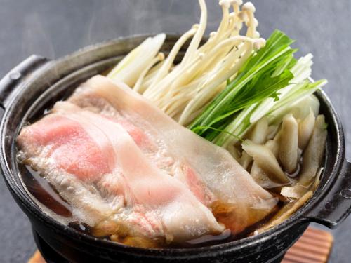 a pan of food with meat and vegetables in it at KAMENOI HOTEL Itako in Itako