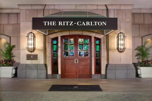 a entrance to the ritz carlton building with a revolving door at The Ritz-Carlton Osaka in Osaka