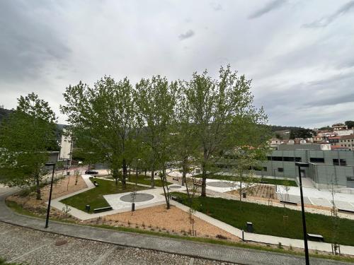 an overhead view of a park with trees and grass at Chalé Caldas de Aregos in Caldas de Aregos