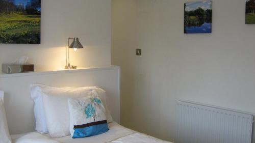 Ένα ή περισσότερα κρεβάτια σε δωμάτιο στο Savannah Bed and Breakfast