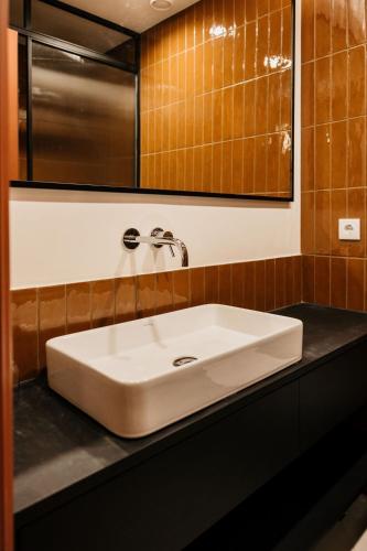 Foto Belion House Deluxe Apartments - República 4