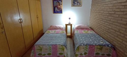 Llit o llits en una habitació de Vogel House