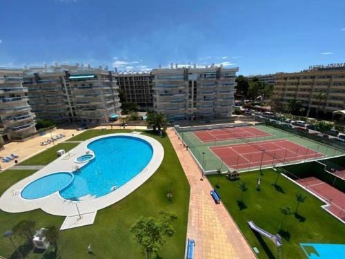 Apartamento tipo Resort, cerca playa, con parking