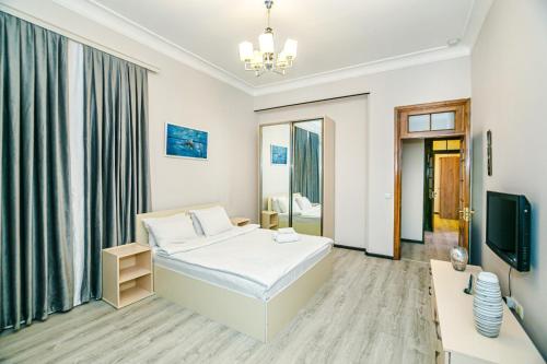TV a/nebo společenská místnost v ubytování WAFT Apartment