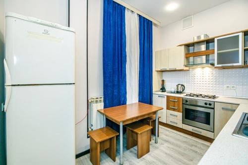 Kuchyň nebo kuchyňský kout v ubytování WAFT Apartment