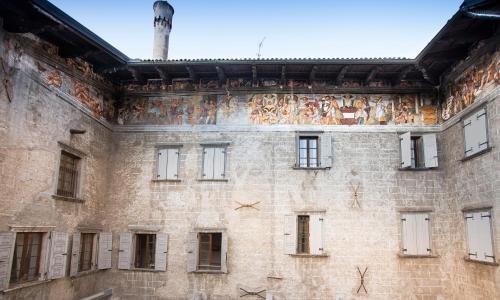 a building with paintings on the side of it at Casa Alla Lega in Arco