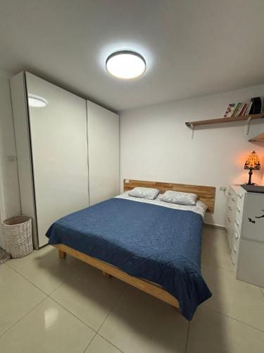 En eller flere senger på et rom på Perfect House 2