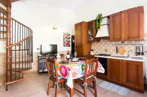 Kuchyň nebo kuchyňský kout v ubytování Casa Epicarmo