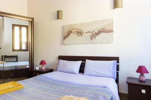 Postel nebo postele na pokoji v ubytování Casa Epicarmo