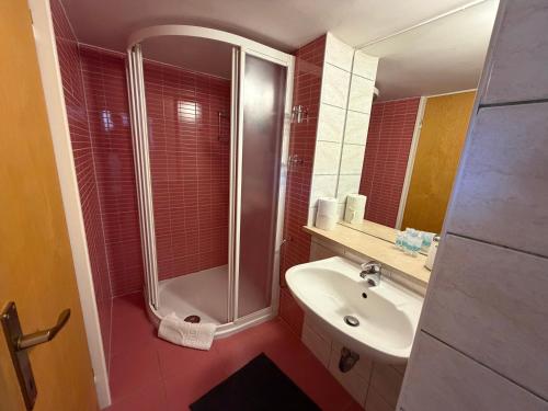 a bathroom with a shower and a sink at Apartments Tedeschi in Korčula