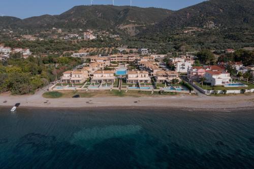 an aerial view of a resort on a beach at Seafront Villa Ciel with Private Pool in Nafpaktos in Nafpaktos