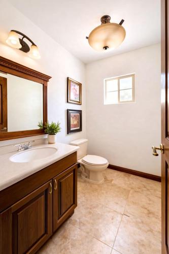 a bathroom with a sink and a toilet at Arroyos del Paraíso Residencial Suite B in Manuel F. Martínez