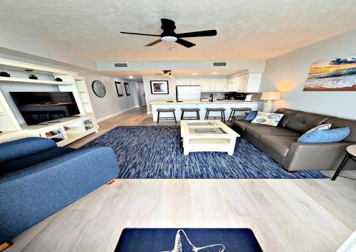 a living room with a couch and a ceiling fan at Just Updated Wyndham Ocean Walk Resort Daytona Beach 1606 One Bedroom Resort Condo Oceanfront in Daytona Beach