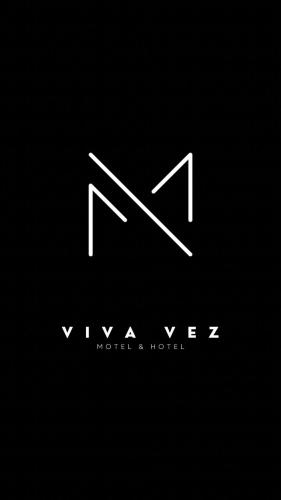 a logo with the initials n and nvlez at Motel Viva Vez in Canoas