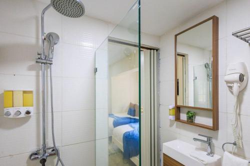 a bathroom with a shower and a sink at Spacious Villa in La Cuaba, Pool in Pedro Brand
