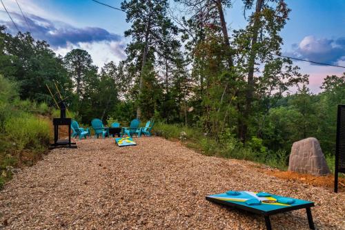 a group of chairs and tables on a gravel road at Dreamers Oasis in Sevierville