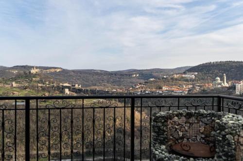a view of a city from a balcony at House 46 in Veliko Tŭrnovo