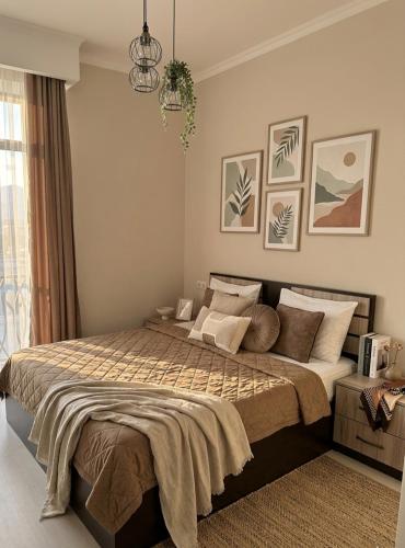 a bedroom with a large bed in a room at Alvina House in Tsaghkadzor