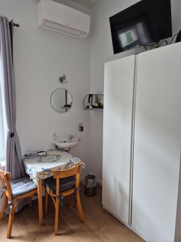 TV a/nebo společenská místnost v ubytování Guest house Adonis