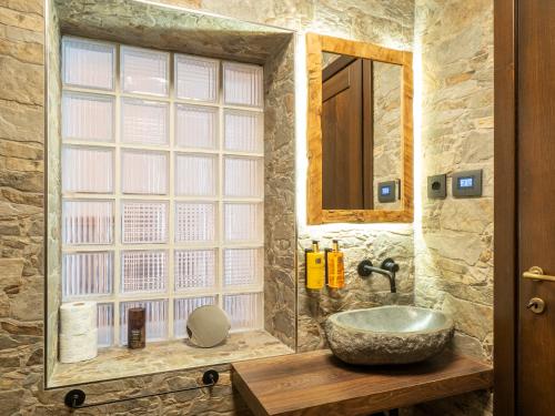a bathroom with a sink and a mirror at Cjase san Pieri in Cividale del Friuli