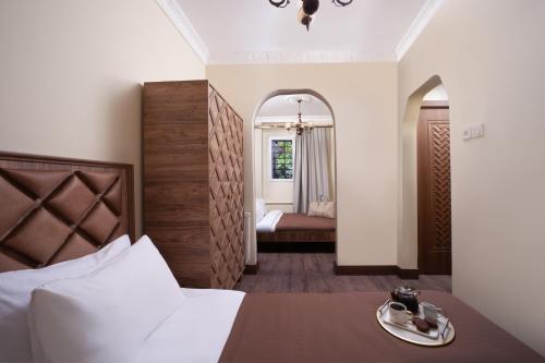 a hotel room with a bed and a mirror at Taxim in Istanbul