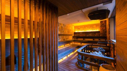 a restaurant with a pool in the middle of a room at OND HOTEL（オンドホテル） in Takeo