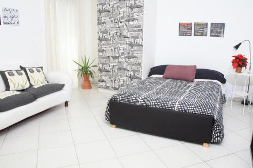 Cama o camas de una habitación en A Casa Mia Apartment