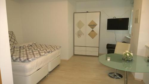 Cama o camas de una habitación en Pensionsappartments Blitz