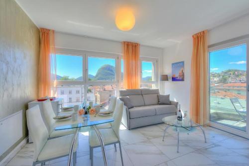 Attico al Parco: Penthouse in Lugano | Balcony, A/C & 2 min from Lake - Happy Rentals