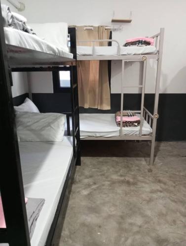 a group of bunk beds in a dorm room at BN Residence in Ko Tao