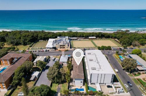 an aerial view of a building with a large circle on the roof at Ocean Spray 5 in Coffs Harbour