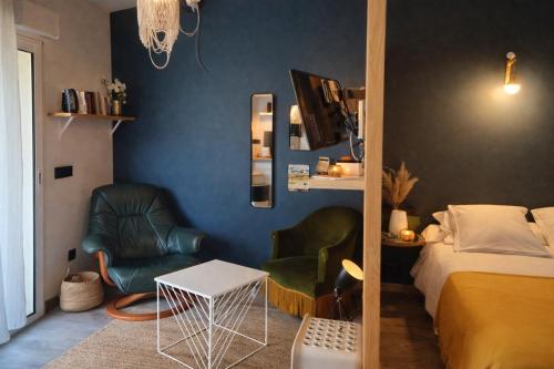 En eller flere senge i et værelse på Le studio
