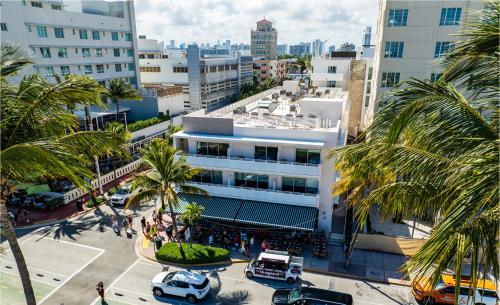 an aerial view of a city with palm trees at Hotel Casa Canita in Miami Beach