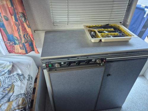 a tool box sitting on top of a counter in a room at Caravane dans les Cévennes in Saint-Germain-de-Calberte