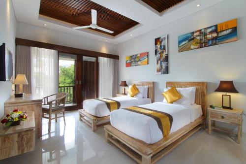 Katil atau katil-katil dalam bilik di The Murdha Villa