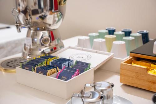 a white box filled with different colored books on a counter at La Pina in Rezzato