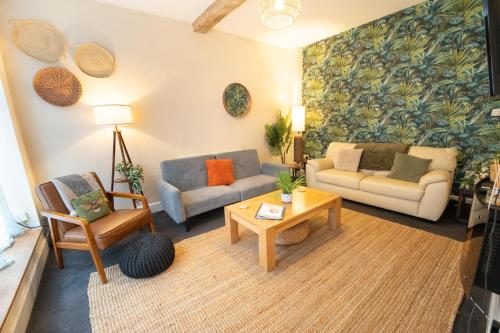 a living room with two couches and a coffee table at The Mews - Worcester City - House - Gated - Self Check In - Free WIFI - 2 Doubles - TVs in bedrooms - Sleeps 6 - Free Nearby Parking in Worcester
