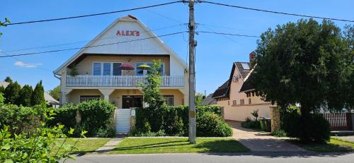 a house with an aacs sign on the side of it at Alex's Hajdúszoboszló in Hajdúszoboszló