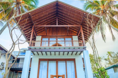 a house with a roof on top of it at R Degrees Boutique Hotel & Spa in Ambalangoda